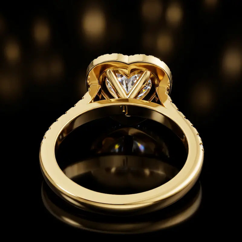 Rear view of a heart cut halo lab-grown diamond engagement ring in 18kt yellow gold.