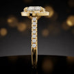 Side profile of a heart cut halo lab-grown diamond engagement ring in 18kt yellow gold.
