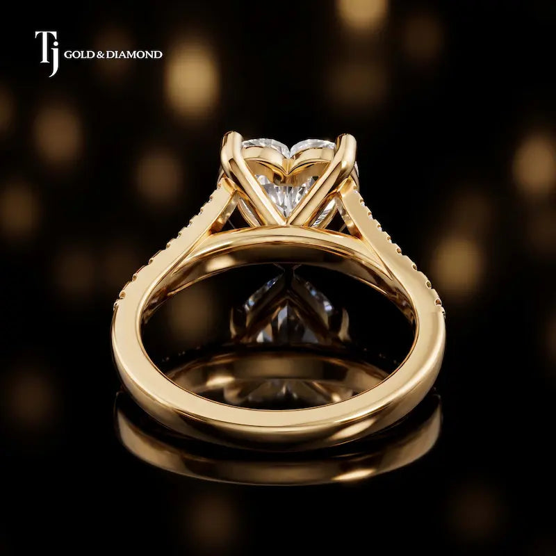 Back view of a heart cut split shank lab-grown diamond engagement ring in 18kt yellow gold.