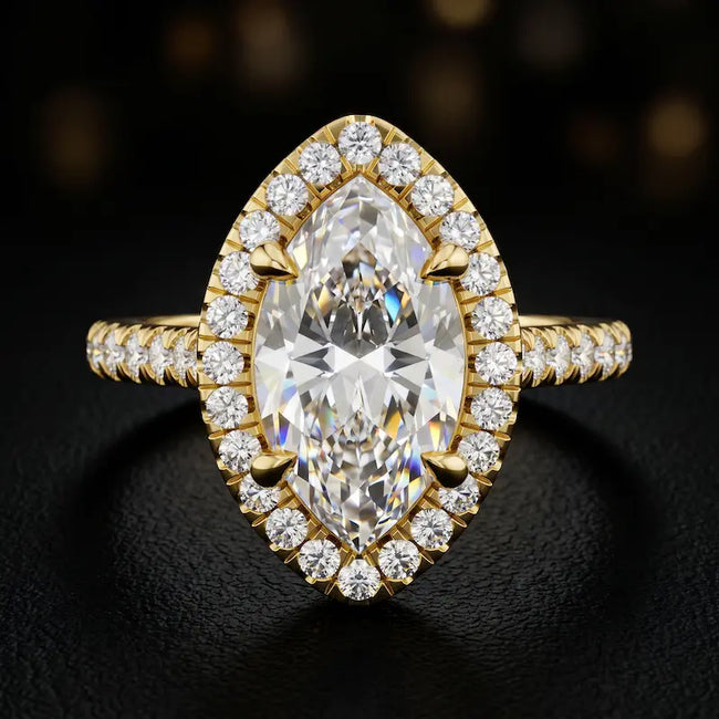 Front view of a marquise cut halo lab-grown diamond engagement ring in 18kt yellow gold.