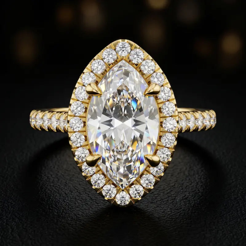 Front view of a marquise cut halo lab-grown diamond engagement ring in 18kt yellow gold.