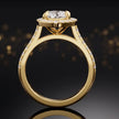 Side view of a marquise cut halo lab-grown diamond engagement ring with diamond-set shoulders in 18kt yellow gold.