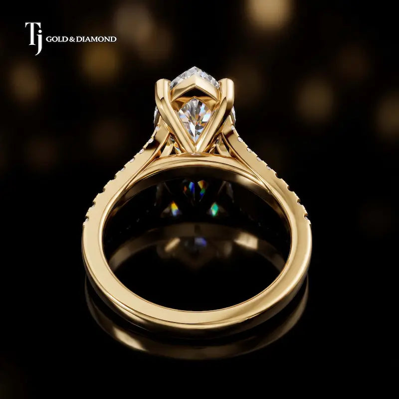 Back view of a marquise cut split shank lab-grown diamond engagement ring in 18kt yellow gold.