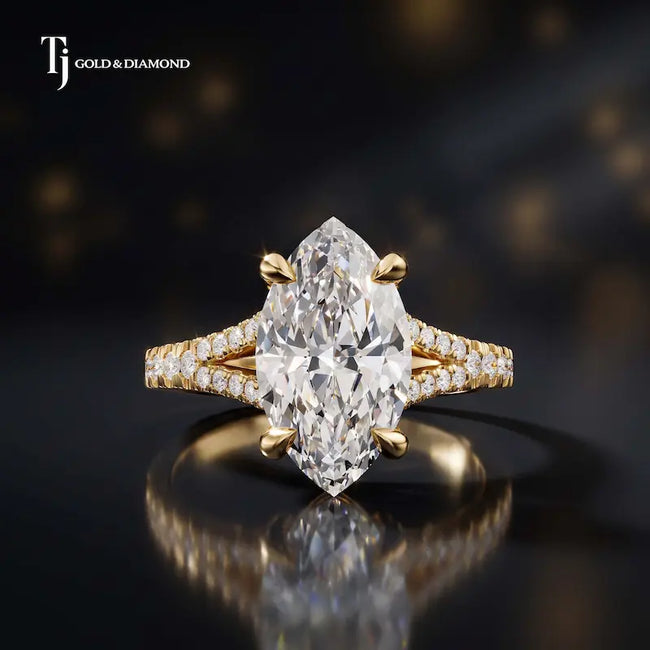 Front view of a marquise cut split shank lab-grown diamond engagement ring in 18kt yellow gold.