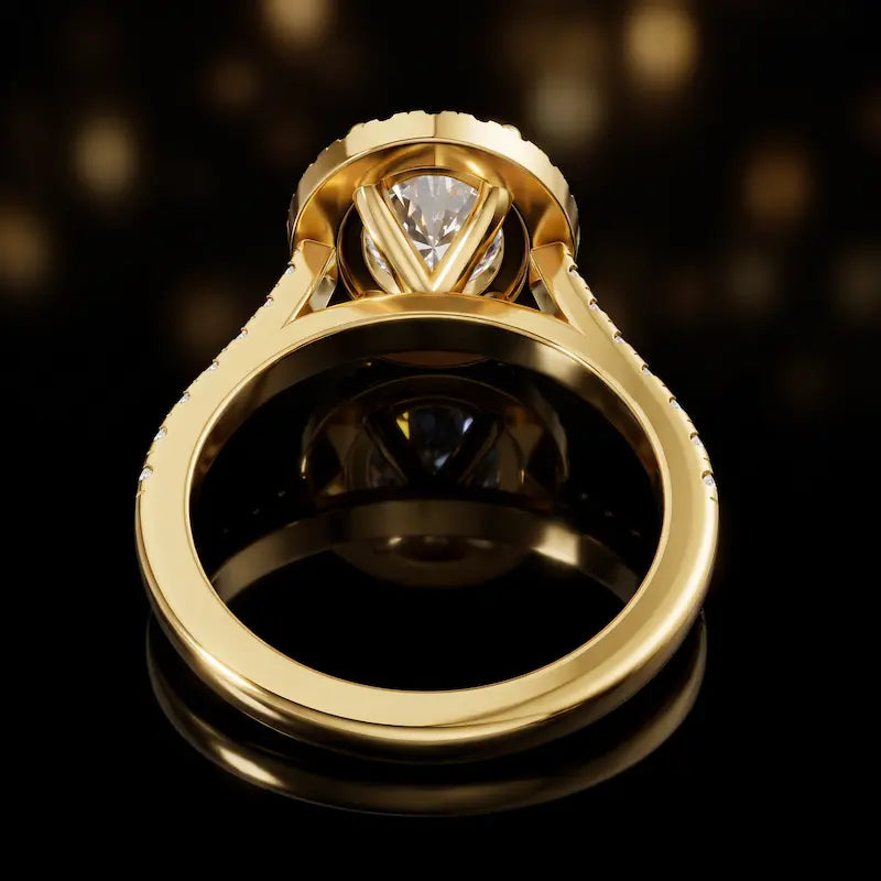 Rear view of an oval cut halo lab-grown diamond engagement ring in 18kt yellow gold.