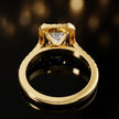 Rear view of a princess cut halo lab-grown diamond engagement ring in 18kt yellow gold.