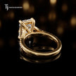 Back view of a radiant cut split shank lab-grown diamond engagement ring in 18kt yellow gold.