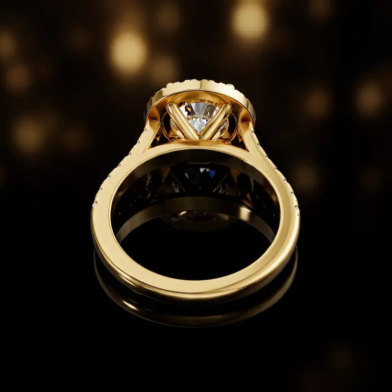 Rear view of a round cut halo lab-grown diamond engagement ring in 18kt yellow gold.