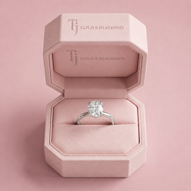 Oval solitaire diamond engagement ring in white gold in jewellery box
