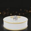 360-degree spinning video of a round cut lab-grown diamond engagement ring with hidden halo in 18kt yellow gold