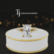 360° product view of a radiant cut split shank lab-grown diamond engagement ring in 18kt yellow gold featuring a radiant-cut centre diamond, classic four-claw cathedral setting and diamond-set split shank.
