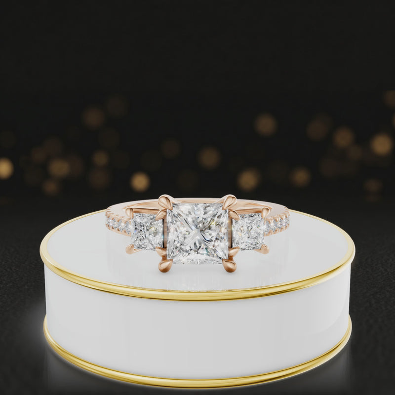 360-degree spinning view of a princess cut three-stone lab-grown diamond engagement ring in 18kt rose gold with diamond shoulders