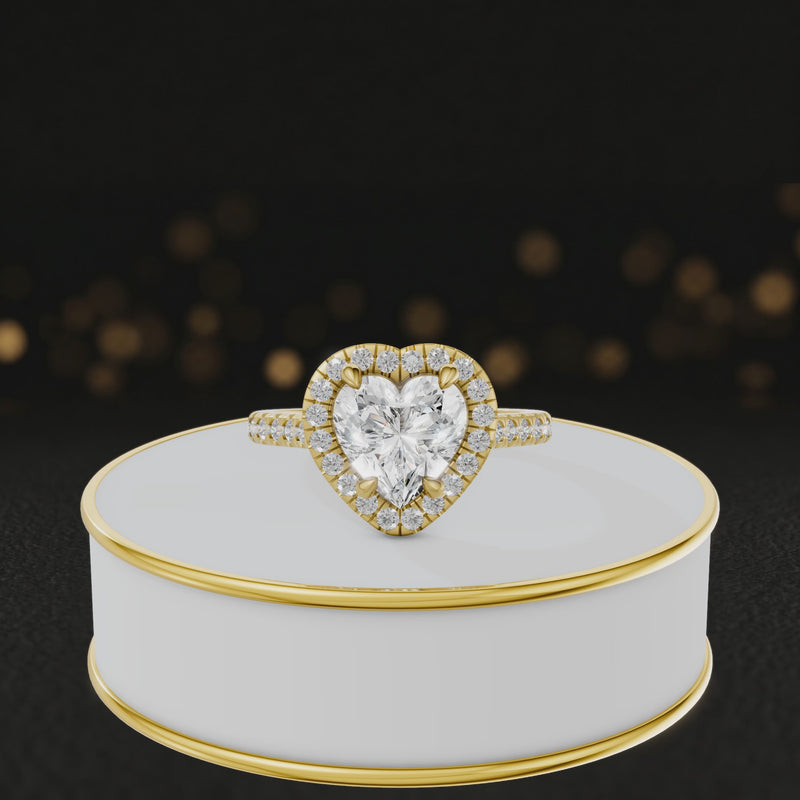 360° video of a Heart Cut Halo Lab-Grown Diamond Engagement Ring in 18kt Yellow Gold featuring a heart-cut centre diamond, sparkling diamond halo and diamond-set shoulders.