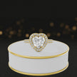 360° video of a Heart Cut Halo Lab-Grown Diamond Engagement Ring in 18kt Yellow Gold featuring a heart-cut centre diamond, sparkling diamond halo and diamond-set shoulders.
