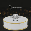 360° product view of an emerald cut split shank lab-grown diamond engagement ring in 18kt white gold featuring an emerald-cut centre diamond, classic four-claw cathedral setting and diamond-set split shank.