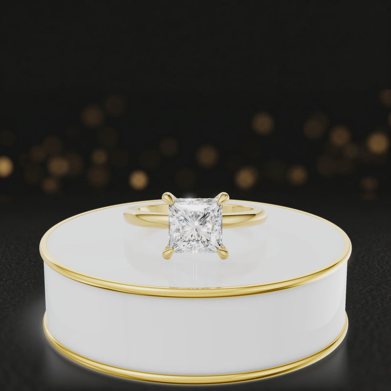 360 degree spinning video of 4-claw princess cut engagement ring with hidden halo in 18kt yellow gold