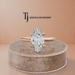 360-degree rotating view of a 1.5 carat marquise cut lab-grown diamond solitaire engagement ring in 18kt rose gold with a 4-claw setting
