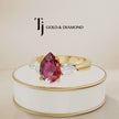360° product view of a pear cut lab-created ruby trilogy engagement ring in 18kt yellow gold with pear cut lab-grown diamond side stones and a classic four claw basket setting.