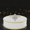 360-degree rotating view of a 1.5 carat round brilliant cut diamond solitaire engagement ring in an 18kt rose gold 6 claw setting by TJ Diamond