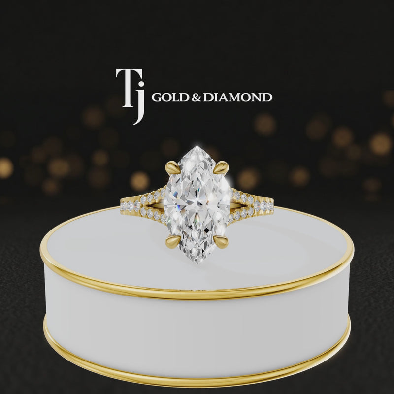 360° product view of a marquise cut split shank lab-grown diamond engagement ring in 18kt yellow gold featuring a marquise-cut centre diamond, classic four-claw cathedral setting and diamond-set split shank.