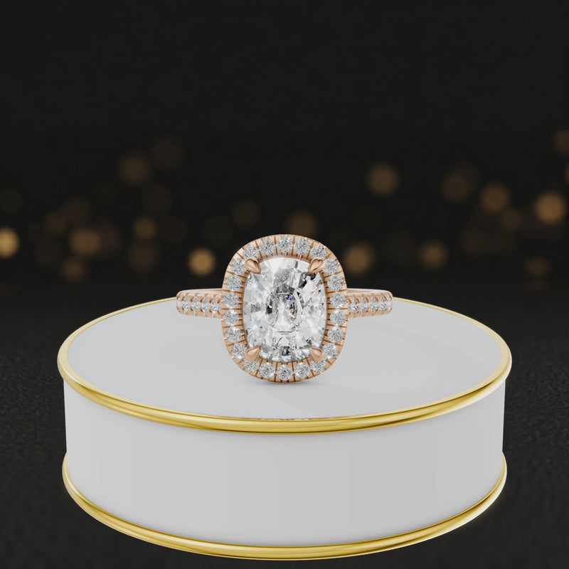 360° video of a Cushion Cut Halo Lab-Grown Diamond Engagement Ring in 18kt Rose Gold featuring a cushion-cut centre diamond, round brilliant diamond halo and diamond-set shoulders.