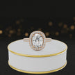 360° video of a Cushion Cut Halo Lab-Grown Diamond Engagement Ring in 18kt Rose Gold featuring a cushion-cut centre diamond, round brilliant diamond halo and diamond-set shoulders.