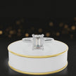 360-degree rotating view of a 1.5 carat emerald cut diamond solitaire engagement ring in an 18kt white gold 4 claw setting by TJ Diamond