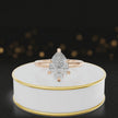 360-degree rotating view of a 1.5 carat pear cut diamond solitaire engagement ring in an 18kt rose gold 6 claw setting by TJ Diamond