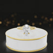 360 degree spinning video of 4-claw pear cut engagement ring with hidden halo in 18kt yellow gold