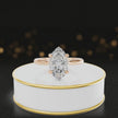 360-degree rotating view of a 1.5 carat marquise cut diamond solitaire engagement ring in an 18kt rose gold 4 claw setting by TJ Diamond