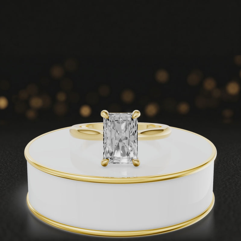 360-degree rotating view of a 1.5 carat Radiant cut diamond solitaire engagement ring in an 18kt yellow gold 4 claw setting by TJ Diamond