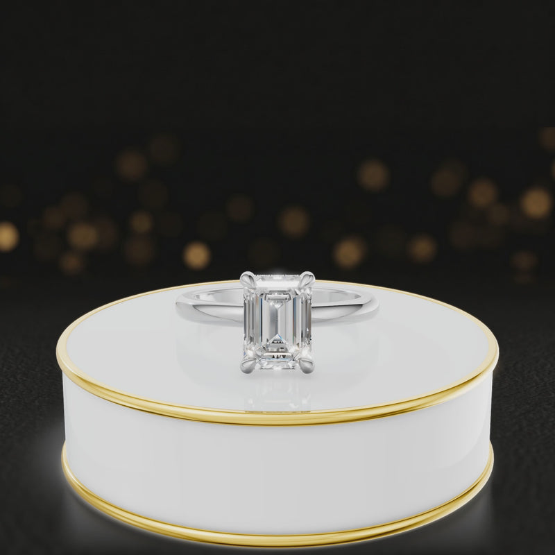 360 degree spinning video of 4-claw emerald cut engagement ring with hidden halo in 18kt white gold