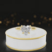 360-degree rotating view of a 1.5 carat heart cut diamond solitaire engagement ring in an 18kt yellow gold 4 claw setting by TJ Diamond