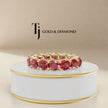 360° product view of a created ruby full eternity ring in 18kt yellow gold with round brilliant lab-created rubies.
