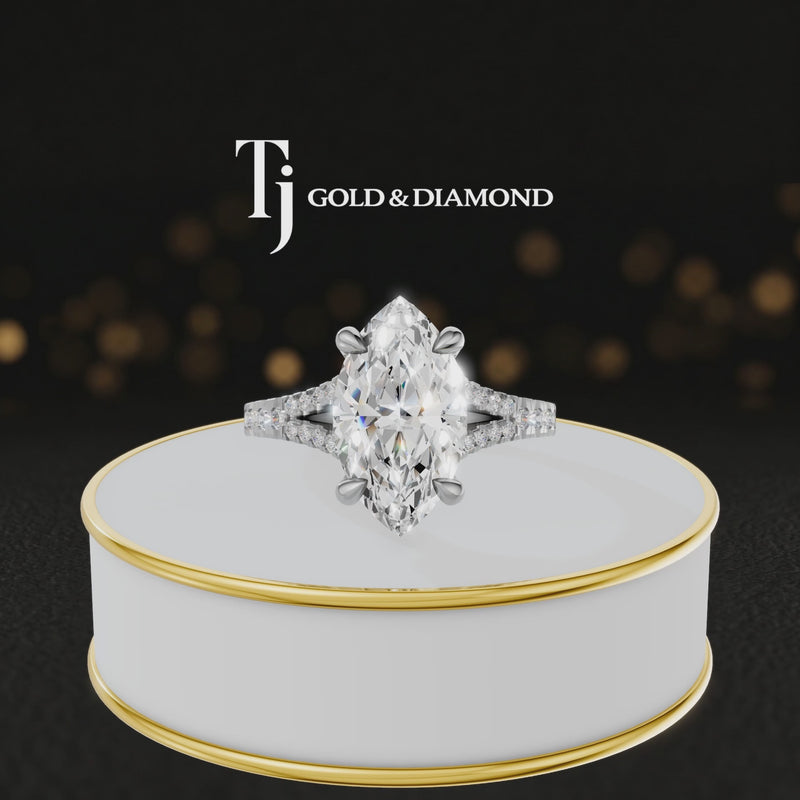 360° product view of a marquise cut split shank lab-grown diamond engagement ring in 18kt white gold featuring a marquise-cut centre diamond, classic four-claw cathedral setting and diamond-set split shank.