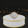 360° video of a Round Cut Halo Lab-Grown Diamond Engagement Ring in 18kt Rose Gold featuring a round brilliant centre diamond, sparkling diamond halo and diamond-set shoulders.