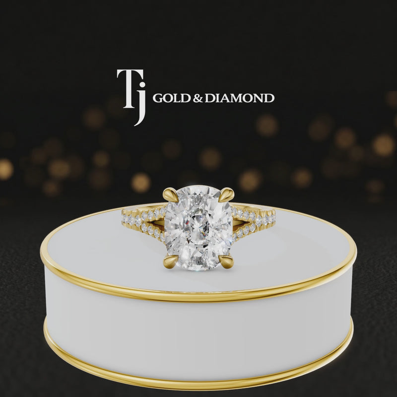 360° product view of a cushion cut split shank lab-grown diamond engagement ring in 18kt yellow gold featuring a cushion-cut centre diamond, classic four-claw cathedral setting and diamond-set split shank.