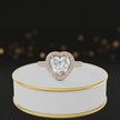 360° video of a Heart Cut Halo Lab-Grown Diamond Engagement Ring in 18kt Rose Gold featuring a heart-cut centre diamond, sparkling diamond halo and diamond-set shoulders.