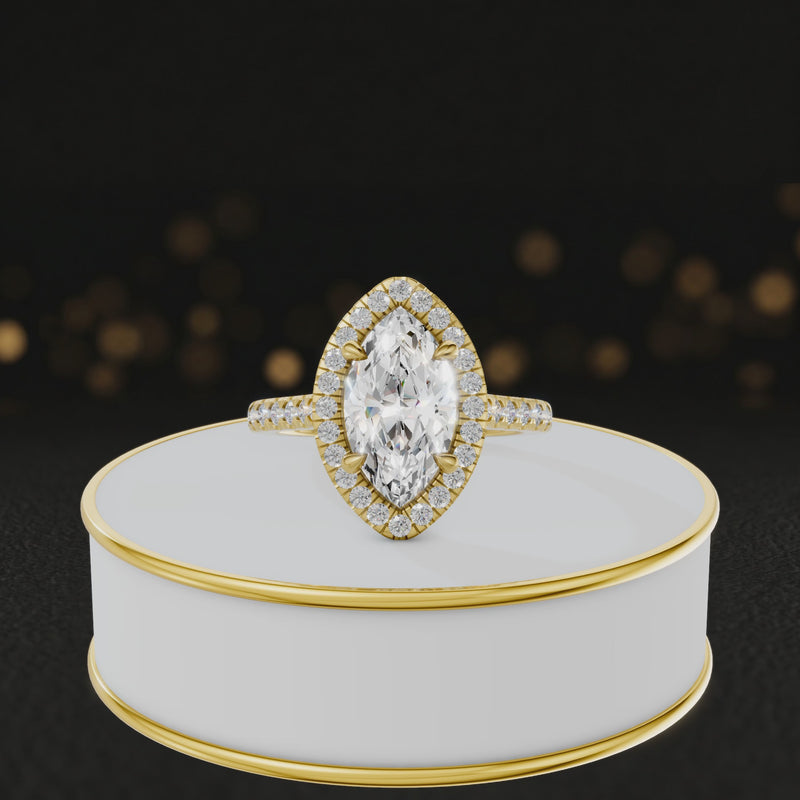 360° video of a Marquise Cut Halo Lab-Grown Diamond Engagement Ring in 18kt Yellow Gold featuring a marquise-cut centre diamond, sparkling diamond halo and diamond-set shoulders.