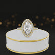 360° video of a Marquise Cut Halo Lab-Grown Diamond Engagement Ring in 18kt Yellow Gold featuring a marquise-cut centre diamond, sparkling diamond halo and diamond-set shoulders.
