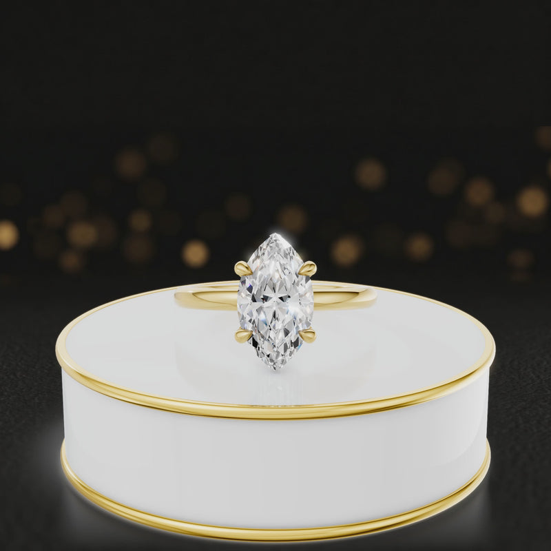 360 degree spinning video of 4-claw marquise cut engagement ring with hidden halo in 18kt yellow gold