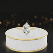 360 degree spinning video of 4-claw marquise cut engagement ring with hidden halo in 18kt yellow gold