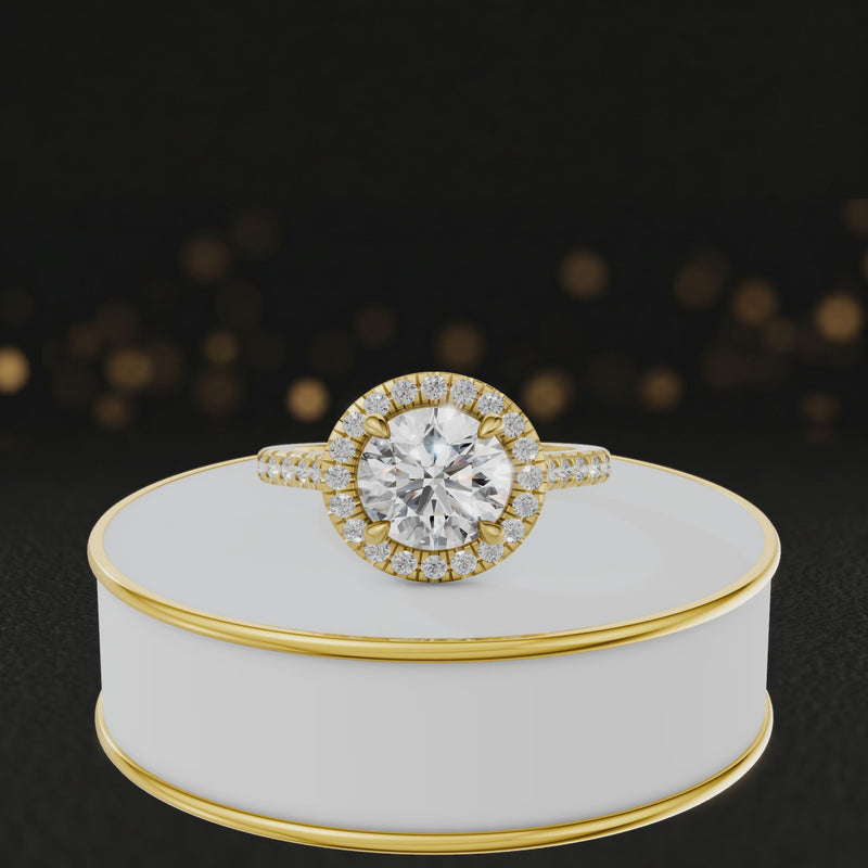 360° video of a Round Cut Halo Lab-Grown Diamond Engagement Ring in 18kt Yellow Gold featuring a round brilliant centre diamond, sparkling diamond halo and diamond-set shoulders.