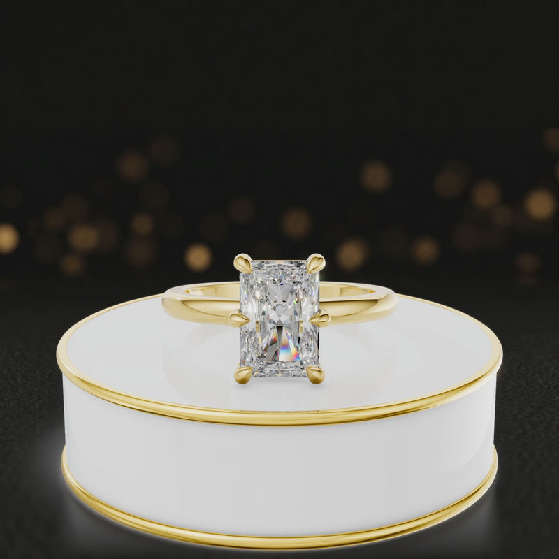 360-degree rotating view of a 1.5 carat radiant cut diamond solitaire engagement ring in an 18kt yellow gold 6 claw setting by TJ Diamond