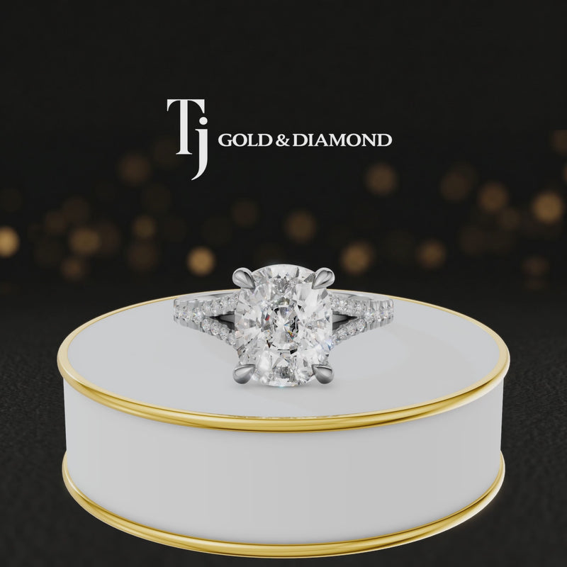 360° product view of a cushion cut split shank lab-grown diamond engagement ring in 18kt white gold featuring a cushion-cut centre diamond, classic four-claw cathedral setting and diamond-set split shank.