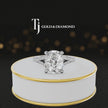360° product view of a cushion cut split shank lab-grown diamond engagement ring in 18kt white gold featuring a cushion-cut centre diamond, classic four-claw cathedral setting and diamond-set split shank.