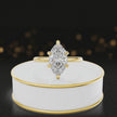 360-degree rotating view of a 1.5 carat marquise cut diamond solitaire engagement ring in an 18kt yellow gold 6 claw setting by TJ Diamond