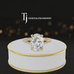 360° product view of an oval cut split shank lab-grown diamond engagement ring in 18kt yellow gold featuring an oval-cut centre diamond, classic four-claw cathedral setting and diamond-set split shank.