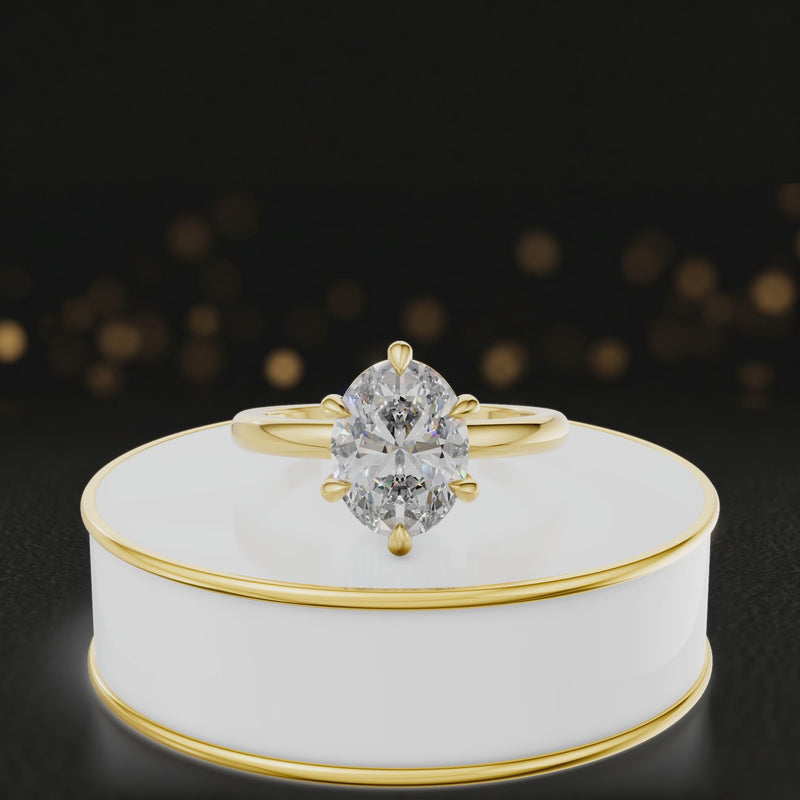 360-degree rotating view of a 1.5 carat cushion cut diamond solitaire engagement ring in an 18kt yellow gold 6 claw setting by TJ Diamond