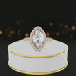 360° video of a Marquise Cut Halo Lab-Grown Diamond Engagement Ring in 18kt Rose Gold featuring a marquise-cut centre diamond, sparkling diamond halo and diamond-set shoulders.